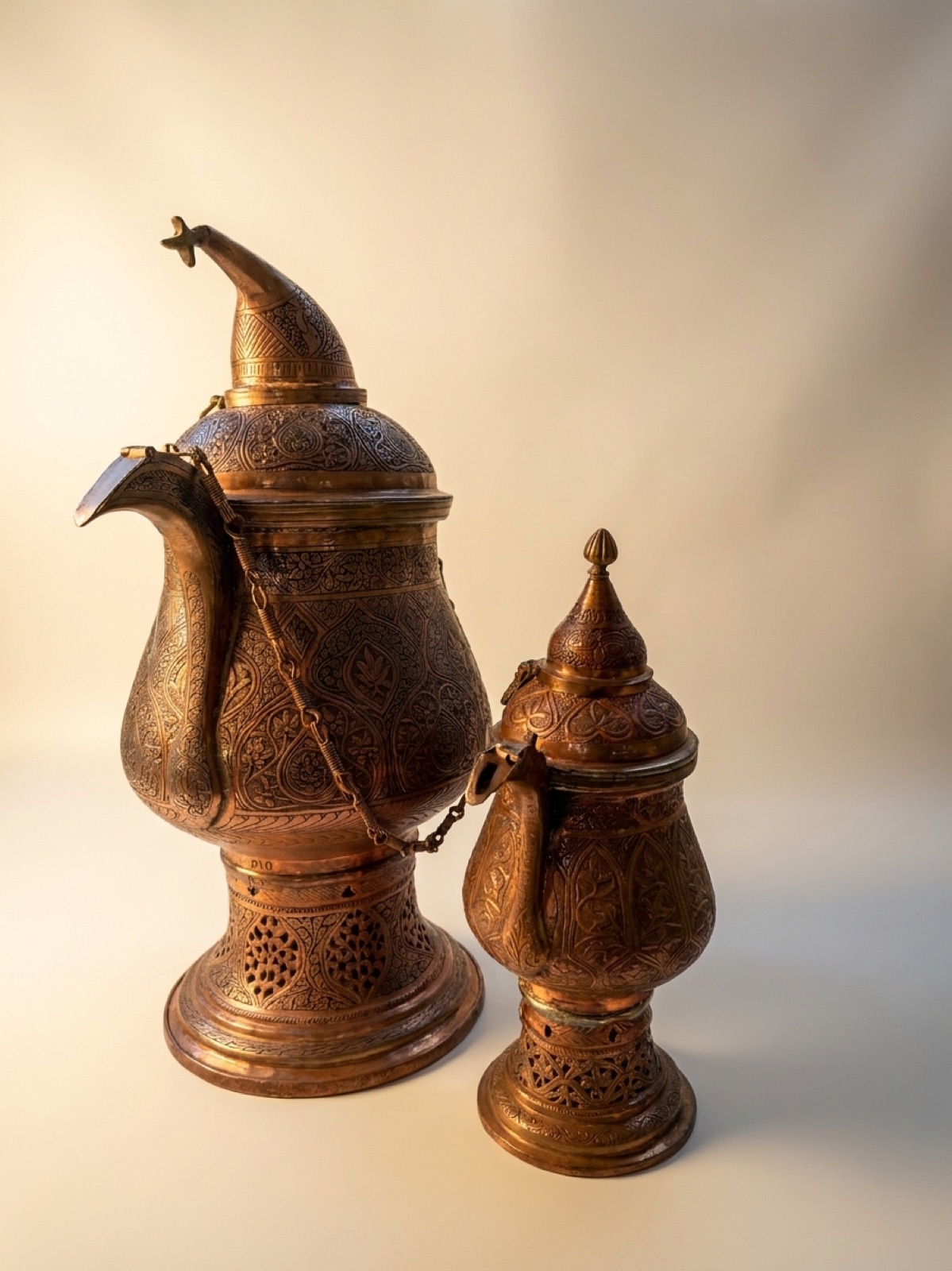 Copper samavar studio shot on cream backdrop