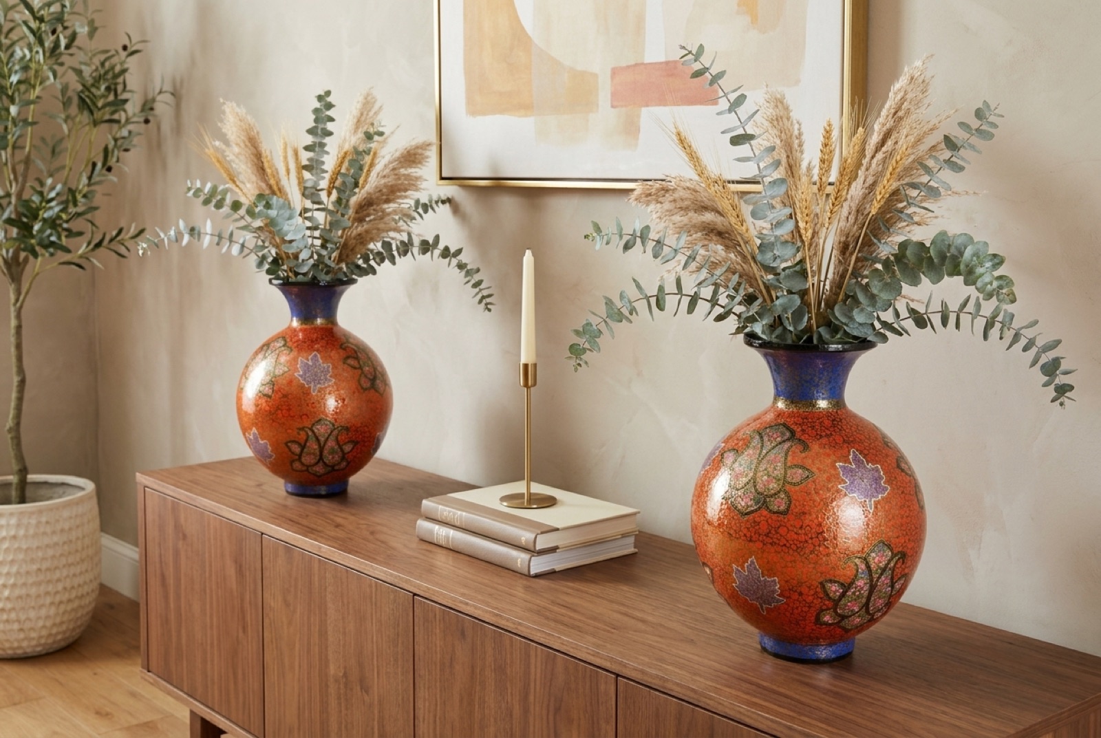 Coral and cobalt vases on a wooden console